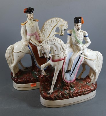 Lot 57 - A pair of Victorian Staffordshire models of...