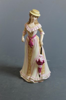 Lot 70 - A collection of four Royal Doulton figurines...