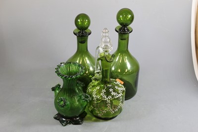 Lot 94 - A pair of green glass decanters and stoppers...