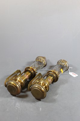 Lot 151 - A pair of early 20th century brass belware...