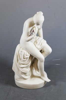 Lot 154 - A Victorian Parian ware figure of a seated...