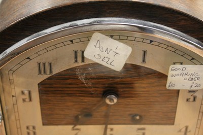 Lot 157 - A 1930s oak cased eight day mantel clock, the...