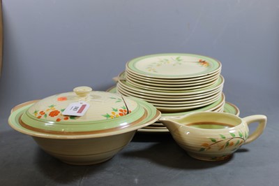 Lot 183 - A 1930s Clarice Cliff part dinner service on a...