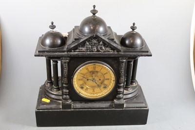 Lot 184 - A late Victorian black slate mantel clock of...