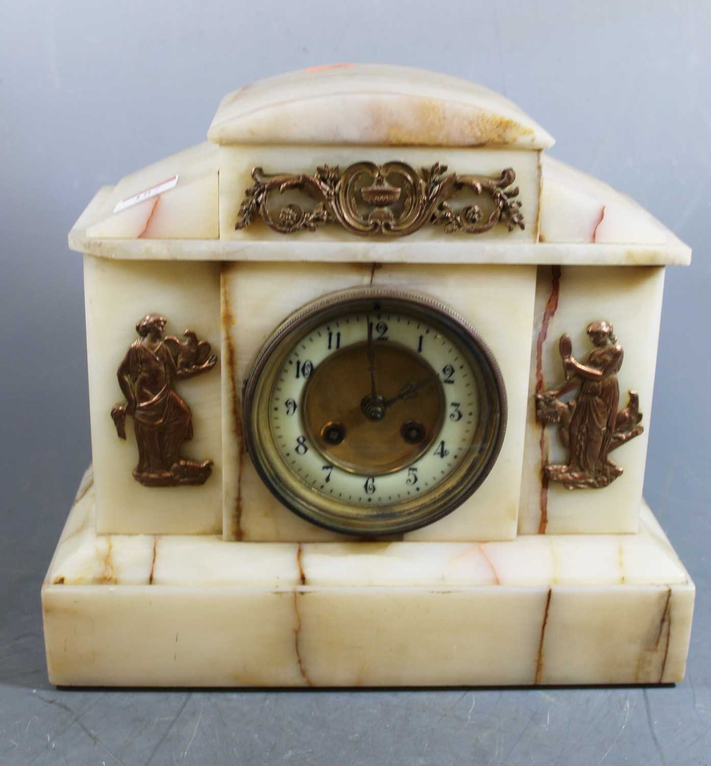 Lot 187 - A late Victorian onyx cased mantel clock of...