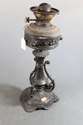 Lot 190 - A late Victorian cast metal pedestal oil lamp,...