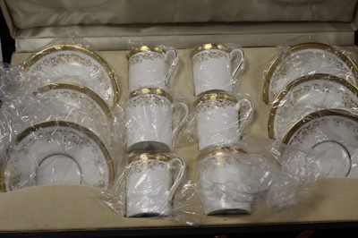 Lot 196 - A Set of six Royal Doulton coffee cans and...
