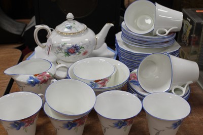 Lot 202 - An early 20th century Shelley part tea service...