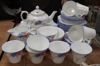 Lot 202 - An early 20th century Shelley part tea service...