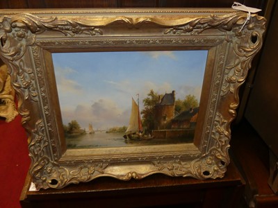 Lot 1092 - A Herkelman - Barges on a Dutch canal, oil on...