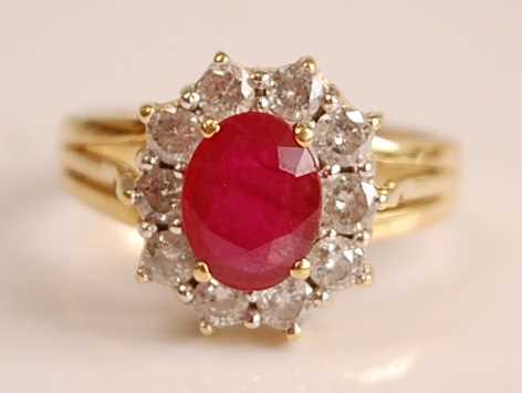 Lot 1093 - A yellow and white metal, ruby and diamond...