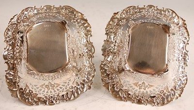 Lot 1039 - A pair of late Victorian silver sweetmeat...