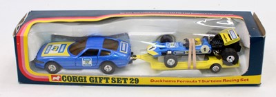 Lot 1197 - A Corgi Toys window box race car gift set...