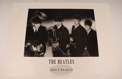Lot 700 - The Beatles, a black and white poster of The...