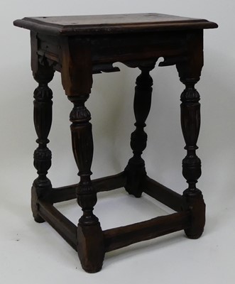 Lot 1350 - A circa 1700 oak joint stool, the one-piece...
