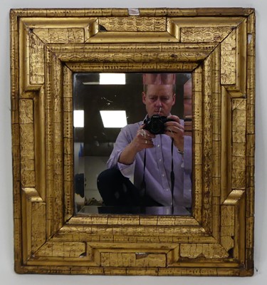 Lot 1365 - An 18th-century giltwood and gesso wall mirror,...