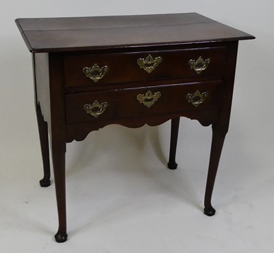 Lot 1403 - A George III oak side table, having a...