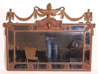 Lot 1373 - A circa 1900 gilt composition wall mirror in...