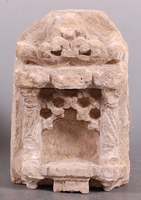 Lot 297 - * A small carved sandstone puja ritual lamp or...