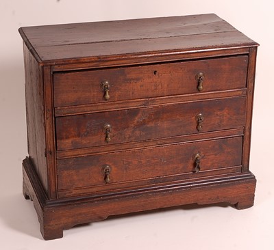 Lot 1381 - An antique oak chest, of small proportions,...