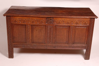 Lot 1382 - A circa 1700 joined oak four-panel coffer, the...