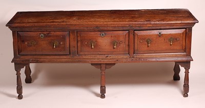 Lot 1383 - An 18th century oak and fruitwood dresser base,...