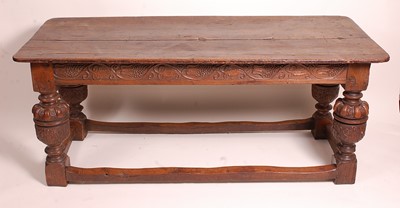 Lot 1384 - An antique oak refectory table, in the...