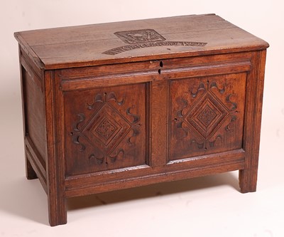 Lot 1377 - A 17th century joined oak two-panel...