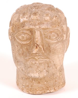 Lot 55 - A marble portrait head, carved as a Roman male,...