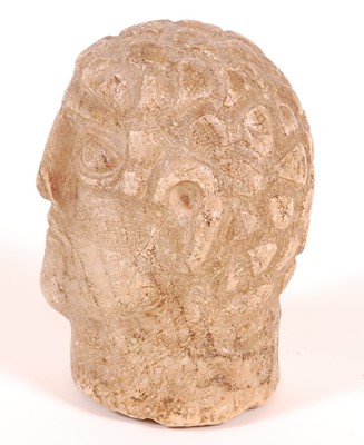 Lot 55 - A marble portrait head, carved as a Roman male,...