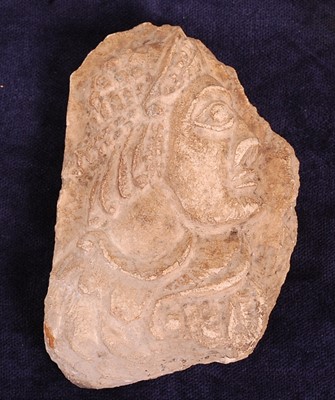 Lot 405 - * A Greco-Roman marble fragment, carved as a...