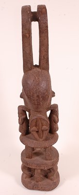 Lot 143 - * A large carved wood Ikenga power figure,...