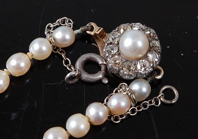 Lot 1098 - A cultured pearl single string necklace, the...