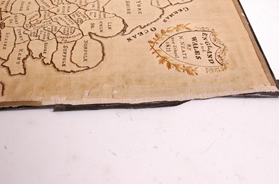 Lot 1210 - An early 19th century silk laid on canvas map...