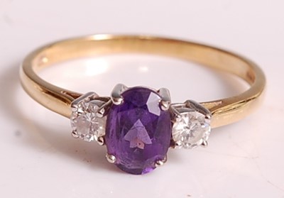 Lot 1127 - An 18ct yellow and white gold, amethyst and...