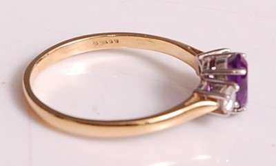 Lot 1127 - An 18ct yellow and white gold, amethyst and...