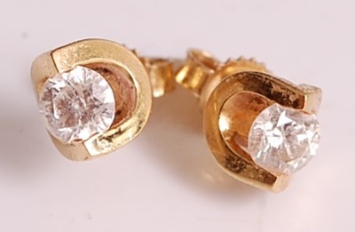 Lot 1105 - A pair of 18ct yellow gold single stone...