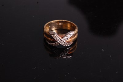 Lot 338 - A 9ct gold band ring, having white stone set...