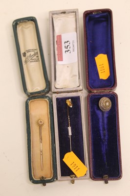 Lot 353 - A yellow metal and diamond set tie-pin;...