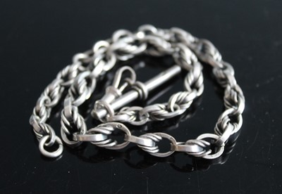 Lot 356 - A silver fancylink watch chain with Albert, 42....