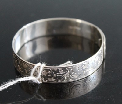 Lot 363 - A silver and engraved child's bangle, Chester...