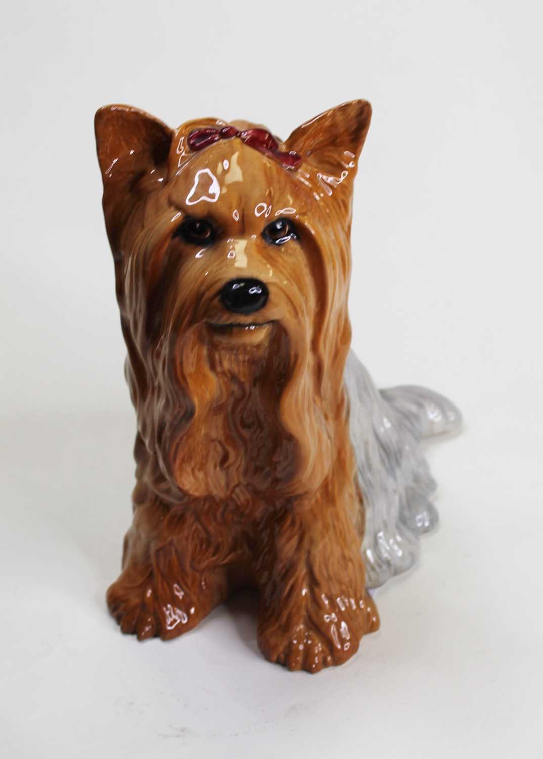 Lot 4 - A Beswick model of a seated Yorkshire terrier,...