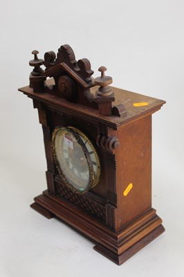 Lot 9 - An early 20th century carved walnut cased...