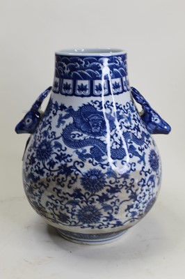 Lot 10 - A modern Chinese export blue and white vase,...