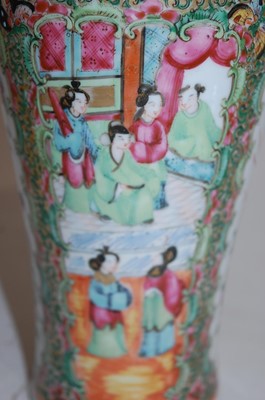 Lot 11 - A pair of late Qing Dynasty famille rose vases,...