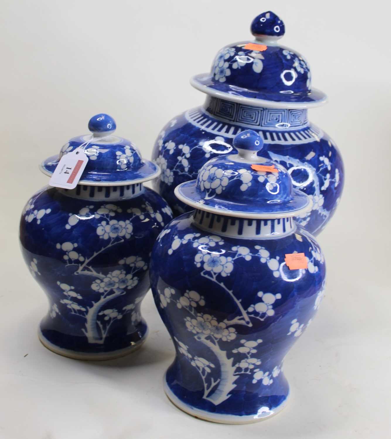 Lot 14 - A garniture of three Chinese blue and white...