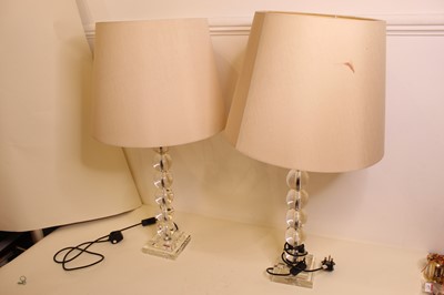 Lot 16 - A pair of modern glass table lamps, of beaded...