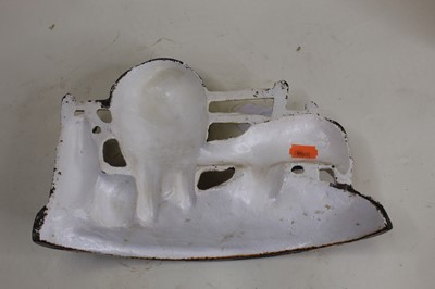 Lot 19 - A cast iron doorstop in the form of a cow and...