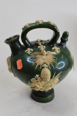 Lot 34 - A 17th century style green glazed wine vessel,...