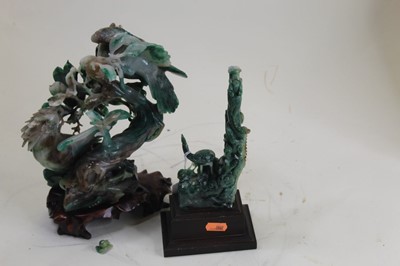 Lot 48 - A Japanese carved green hardstone model of...